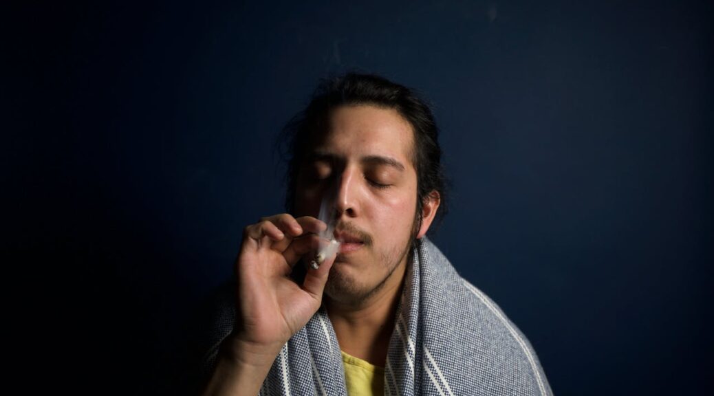 a person smoking weed